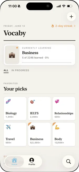 Vocaby home screen with curated vocabulary decks for Business, IELTS, Biology, Travel, and more, plus a learning streak